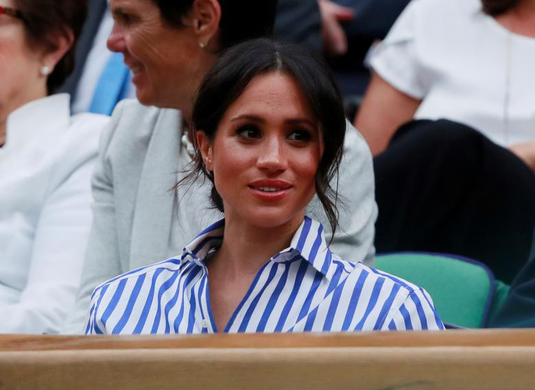 Nữ Công tước xứ Sussex tới cổ vũ cho vận động viên Serena Williams. Ảnh: Reuters.