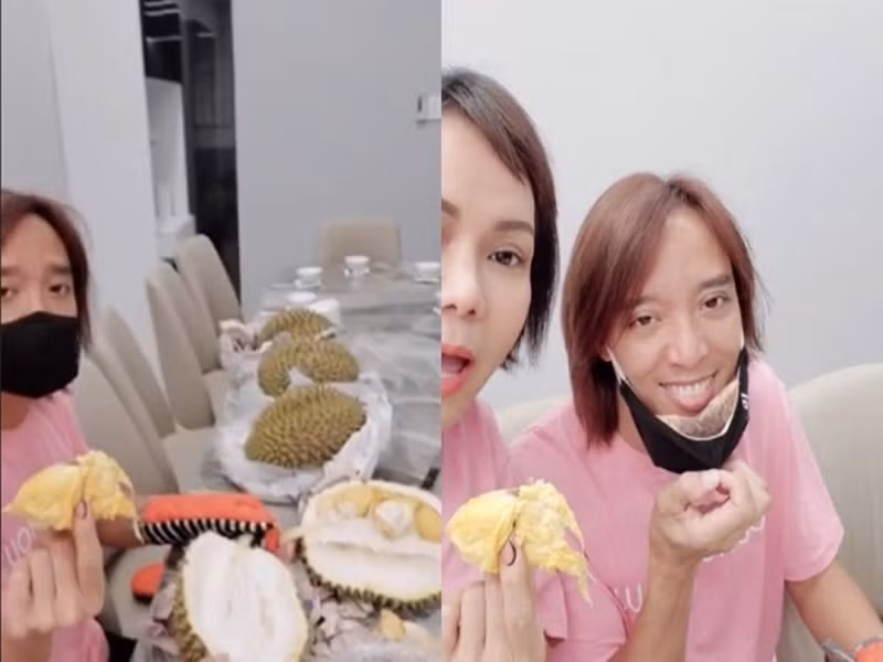 Mặc dù không thích mùi sầu riêng, Hoài Phương vẫn nhiệt tình xẻ từng quả cho bà xã ăn. Ảnh: Người đưa tin