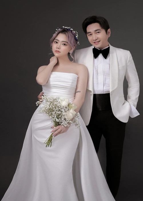 Bảo Anh xinh đẹp, gợi cảm trong hai mẫu váy cưới trắng.