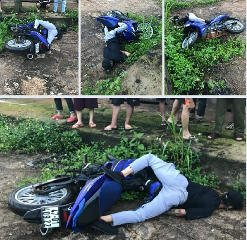 Phat hien thi the nam thanh nien chet canh xe may o giua duong