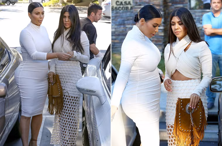 Chỉ đến khi chụp nghiêng, trông bà Kanye West mới có chút ra dáng bà bầu. Kim cho biết con trai cô sẽ chào đời vào tháng 12 tới.