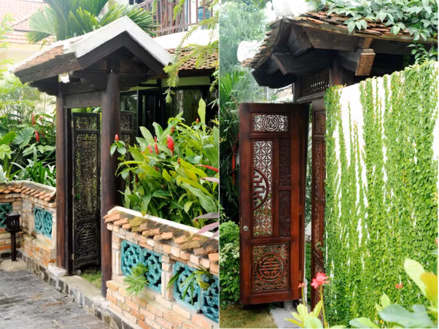 Với triết lý sống thiền tịnh, ca sỹ Hồng Nhung thiết kế không gian sống mang đậm chất Á Đông, gần gũi thiên nhiên mà không kém phần đẹp tinh tế, chiếc cổng gỗ trạm trổ cầu kì với màu nâu trầm mặc, bức tường rêu, cỏ leo xanh mượt.