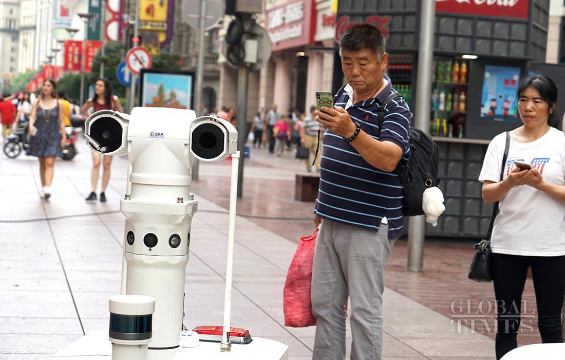 Cư dân mạng ví Thượng Hải như đang sống trong thế kỷ tương lai, nơi con người và công nghệ hòa hợp.(Ảnh: Yang Hui/GT)