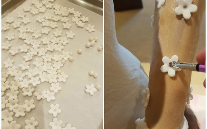 Tất cả mọi chi tiết trên chiếc bánh, dù là nhỏ nhất, đều được làm thủ công một cách hết sức tỉ mỉ. (Ảnh: Chinanews)