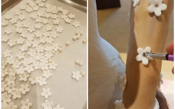 Tất cả mọi chi tiết trên chiếc bánh, dù là nhỏ nhất, đều được làm thủ công một cách hết sức tỉ mỉ. (Ảnh: Chinanews)