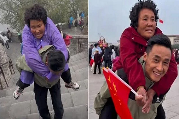 Nam thanh niên cõng mẹ bị liệt đi du lịch khắp Trung Quốc Nam thanh nien cong me bi liet di du lich khap Trung Quoc