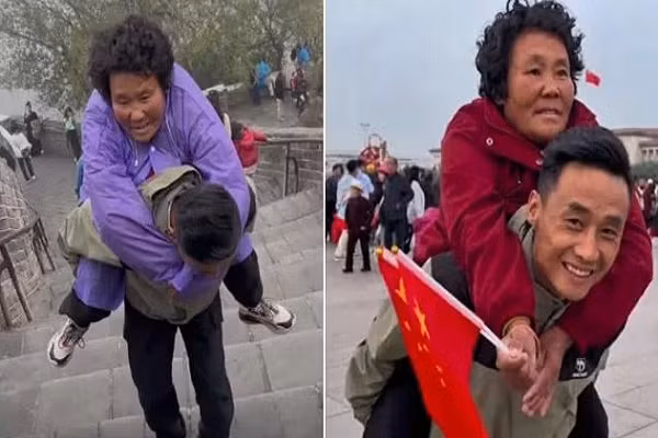 Nam thanh nien cong me bi liet di du lich khap Trung Quoc