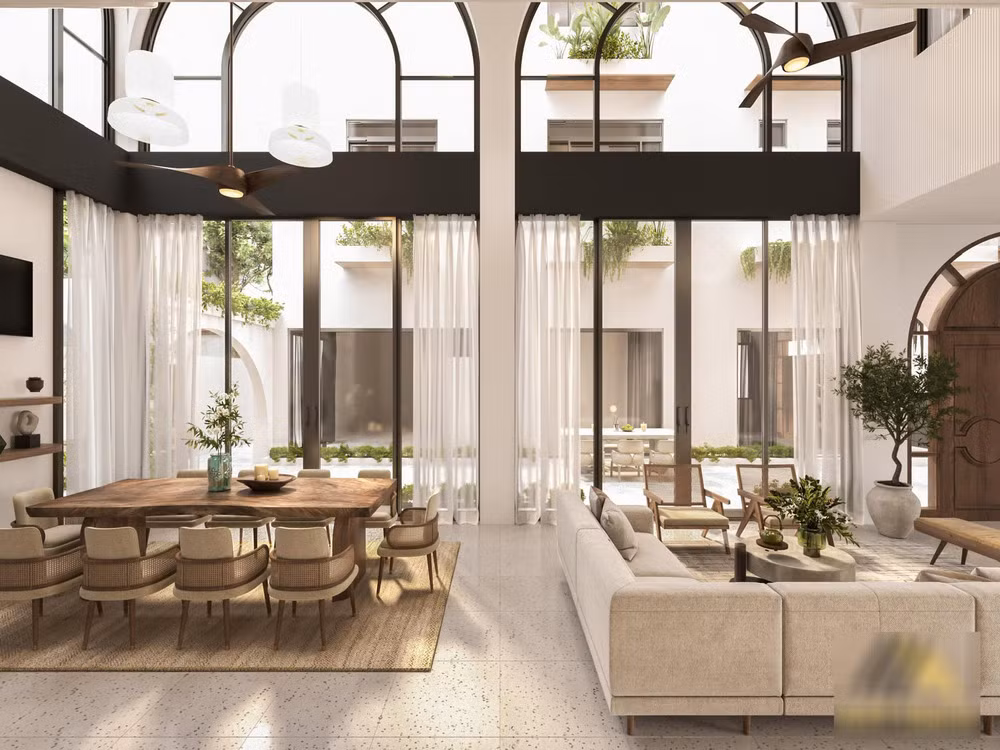 Phòng khách liên kết với bàn ăn, có không gian thoáng đãng.