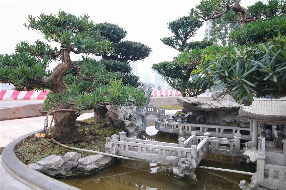 Được biết, nghệ nhân phải mất gần 1 năm để cân nhắc, lựa chọn và dựng tiểu cảnh cho tác phẩm. Ảnh: Dân trí