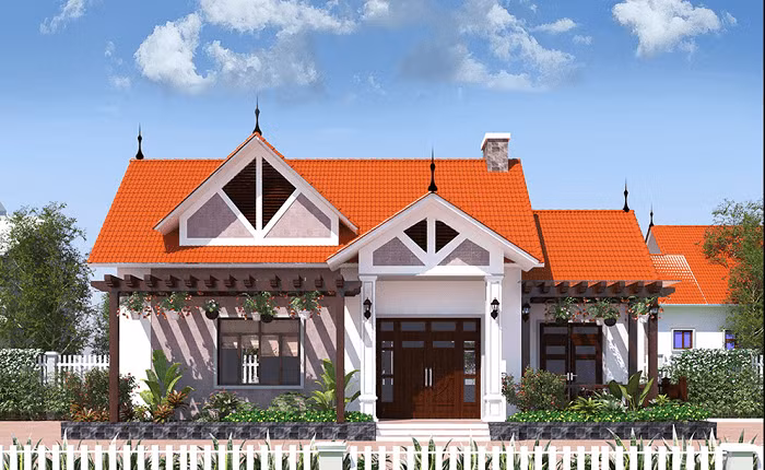 Gam màu kem tươi sáng cùng mái ngói màu đỏ truyền thống nổi bật cho ngôi nhà thêm phần nổi bật. Ảnh: Congtythietkenhadep