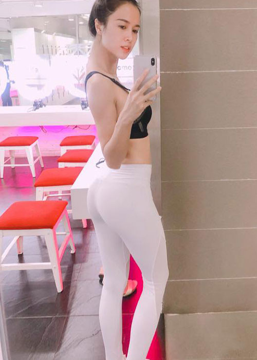 Vũ Ngọc Anh khoe dáng chuẩn nhờ tập gym.