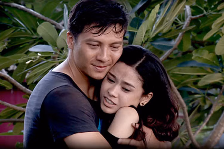 Trương Quỳnh Anh từng có những cảnh tình tứ với Dương Hoàng Anh trong bộ phim "Săn vàng" lên sóng năm 2014. Ảnh: Khám phá