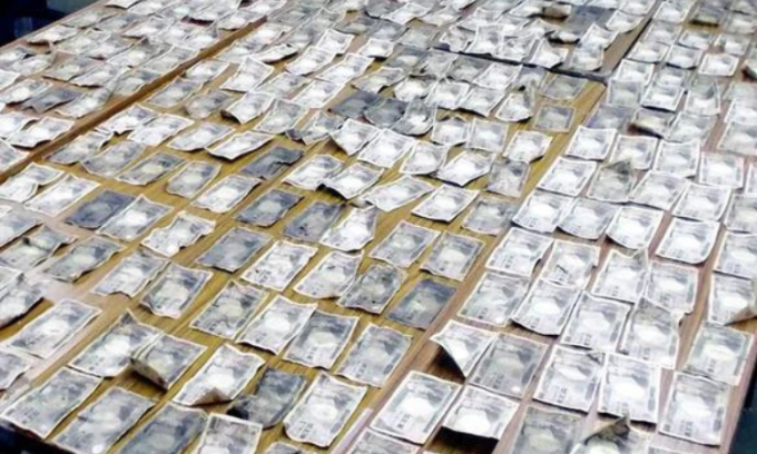 Nhat Ban: Phat hien boc tien khung trong dong rac