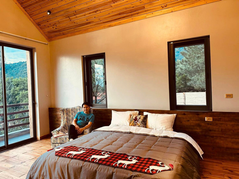 Phòng ngủ được thiết kế đơn giản.