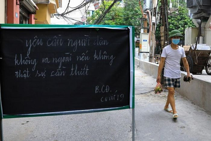 Cuộc sống người dân phường Văn Chương đã dần ổn định trở lại sau gần 1 tháng cách ly y tế. (Ảnh: Thành Đạt/TTXVN)