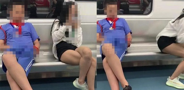 Ngoi canh gai xinh, nam sinh tieu hoc co hanh dong do mat