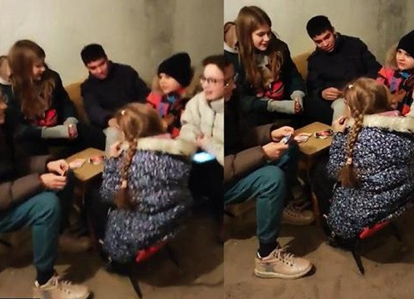 Tre em Ukraine hat quoc ca khi tron duoi ham tru bom