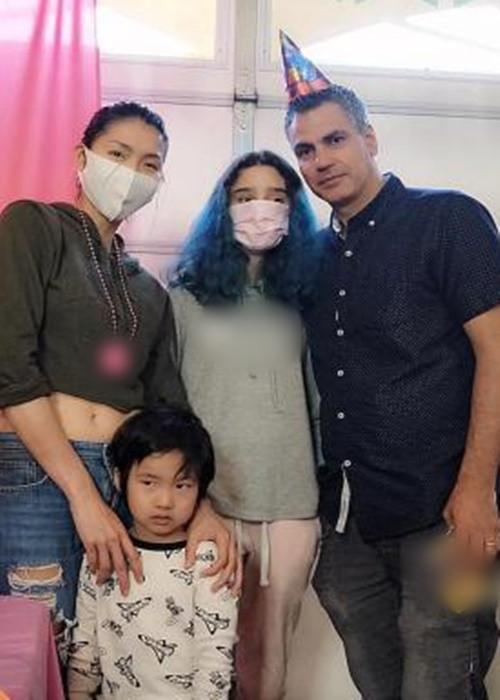 Ngọc Quyên và bạn trai từng chụp ảnh thân thiết với con riêng của cả hai. Ảnh: Công lý và xã hội