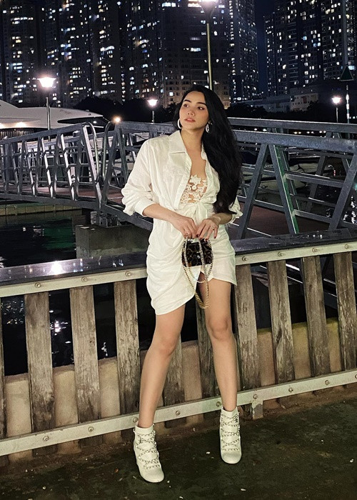 Sau khi lấy chồng, Trang Nhung không đóng phim mà tập trung thiết kế thời trang.