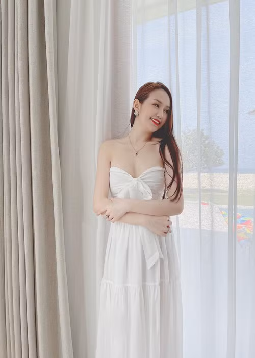 Bà xã của Tuấn Hưng là một trong những hot girl đời đầu của Hà Nội.