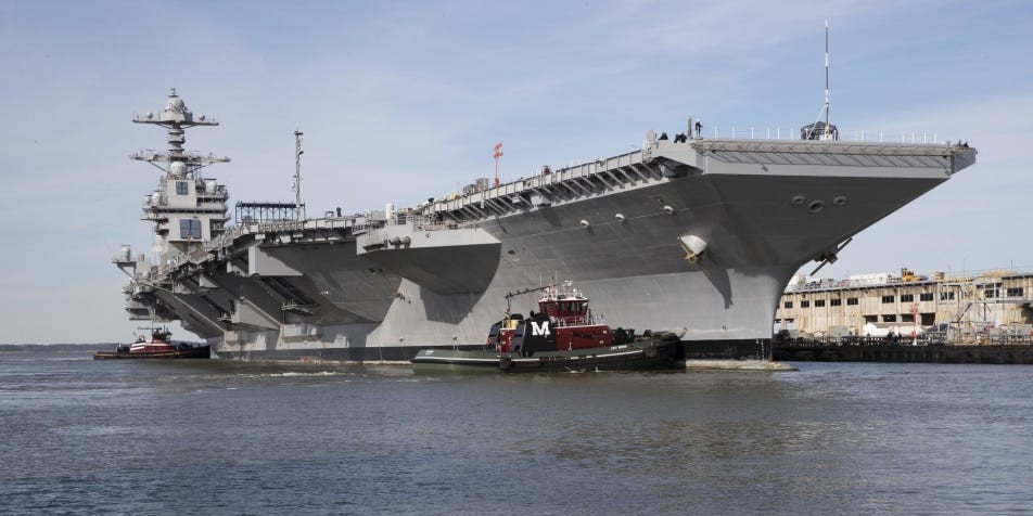 Khi đó bà là giám đốc điều hành của Văn phòng điều hành chương trình vận chuyển máy bay (2013-2019), nơi bà chịu trách nhiệm về danh mục đầu tư mua lại trị giá 40 tỷ đô la bao gồm thiết kế và chế tạo tàu sân bay lớp Ford, thực hiện Tổ hợp tiếp nhiên liệu giữa đời Đại tu cho các tàu sân bay lớp Nimitz và duy trì vòng đời cho tất cả các tàu sân bay USN đang hoạt động.