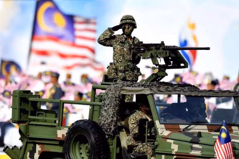 Xe vận tải cỡ nhỏ của quân đội Malaysia với súng máy .50 Cal (12,7mm) đặt trên nóc. Nguồn ảnh: ST.