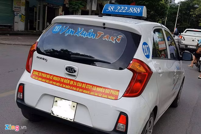 Ha Noi cung yeu cau taxi go khau hieu phan doi Uber, Grab