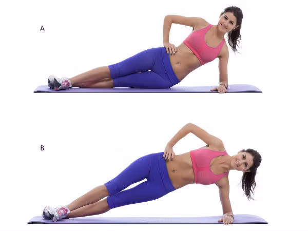 Ngày 15 đến 20: Đây là lúc thử thay đổi. Hãy thử làm động tác Plank một bên và giữ tư thế này trong 1 phút.