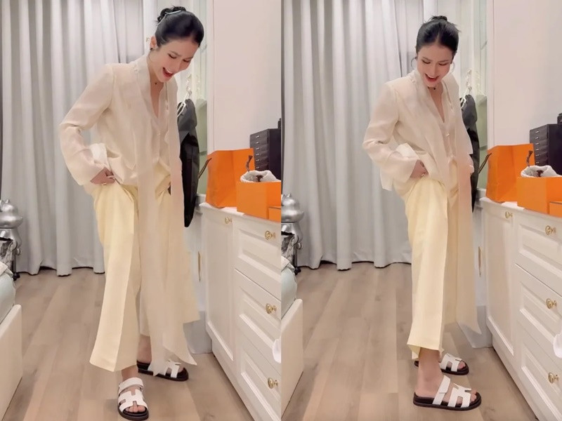 Đàm Thu Trang cũng hào phóng với bạn bè. Cô tặng Diệp Lâm Anh đôi dép hiệu. Ảnh: Saostar.