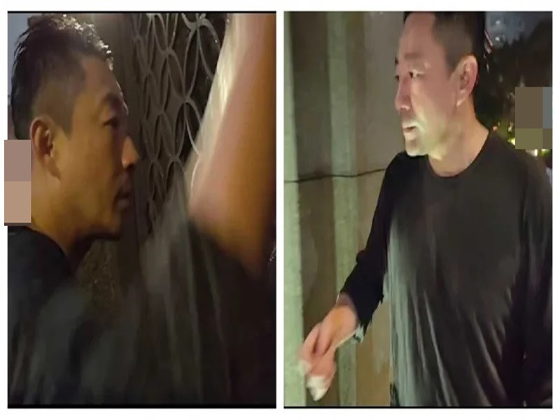 Uông Tiểu Phi dầm mưa rồi trở lại biệt thự. Ảnh: Ctwant.