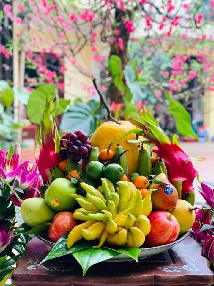 Tháng Giêng, người kinh doanh mâm đồ cúng tới tấp chốt đơn - Hình 2 Thang Gieng, nguoi kinh doanh mam do cung toi tap chot don-Hinh-2