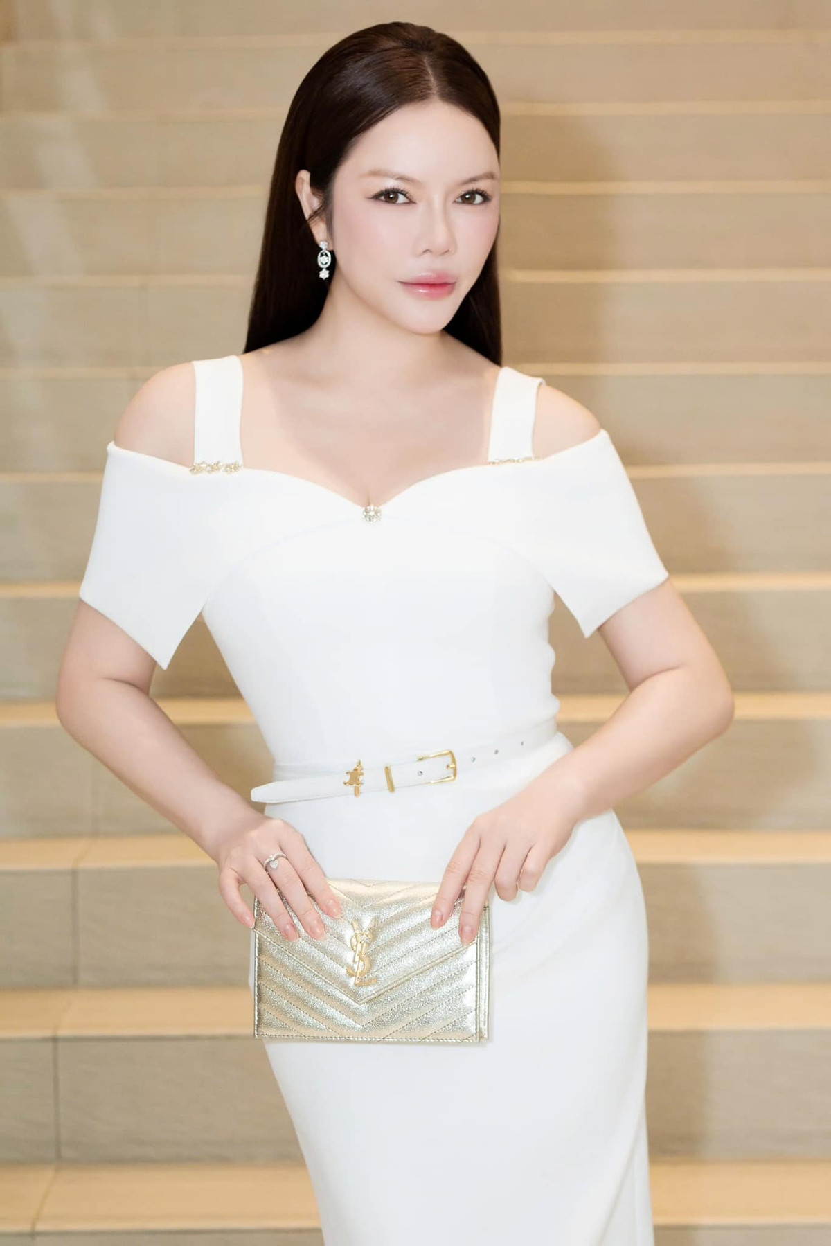 Lý Nhã Kỳ ăn mặc lịch sự, sang trọng đi sự kiện. Ảnh: FB Ly Nha Ky - Artist