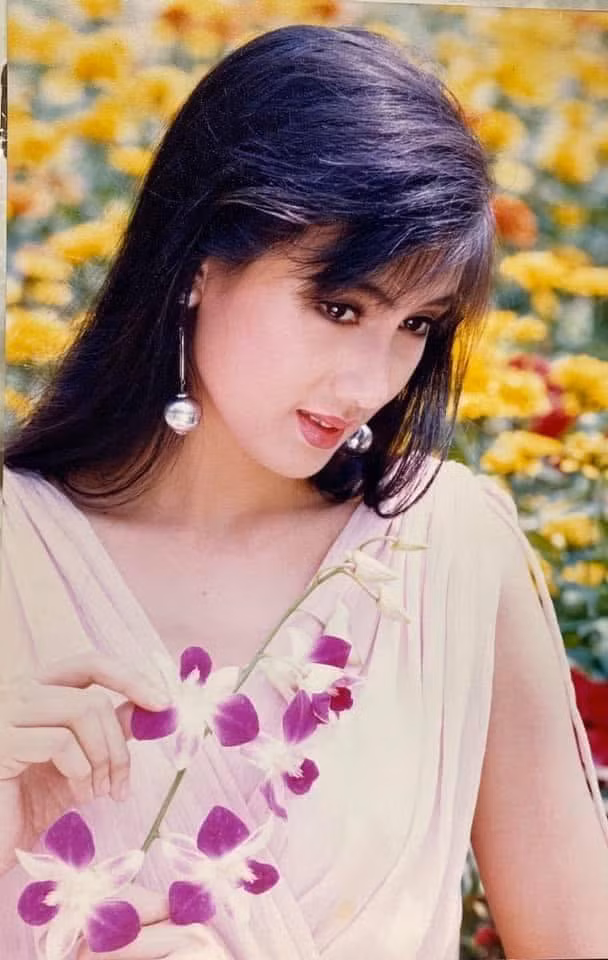 Những hình ảnh này không chỉ khơi gợi ký ức về một thời hoàng kim của dòng ảnh lịch Việt Nam mà còn chứng minh cho vẻ đẹp tự nhiên, không dao kéo của Hiền Mai. Ảnh: FB Hiền Mai