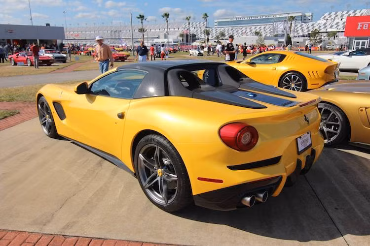 Mẫu xe đua cổ cũng là nguồn gốc tên gọi SP275. Chữ "RW" trong tên của xe là viết tắt tên của người đặt hàng - nha sĩ Rick Workman tại Florida, Mỹ. Chỉ được sản xuất đúng 1 chiếc, SP275 RW Competizione có động cơ 6.3l nạp khí tự nhiên V12 với công suất 769 mã lực và mô-men xoắn cực đại 705 Nm. Toàn bộ sức mạnh được truyền tới bánh sau thông qua hộp số F1 DCT nâng cấp.