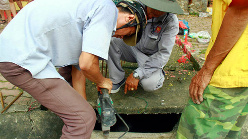 Binh Duong: Den mua mua la co nguoi chet vi… lot cong-Hinh-4