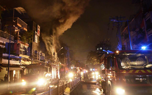 Vu chay kinh hoang o TP HCM qua loi nhan chung-Hinh-3