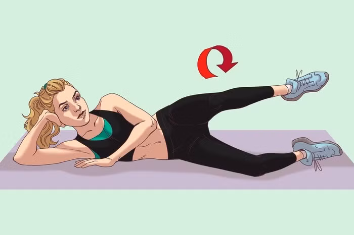 8. Xoay tròn chân - Nằm xuống, hơi co chân về phía trước. - Nâng một chân lên cao. Làm chuyển động tròn chậm theo chiều kim đồng hồ. - Mỗi bên thực hiện 10 lần.