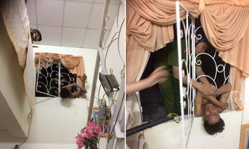 Công an giải cứu đối tượng chui cửa sổ trộm cắp bị mắc kẹt. Ảnh: Công an TP.HCM