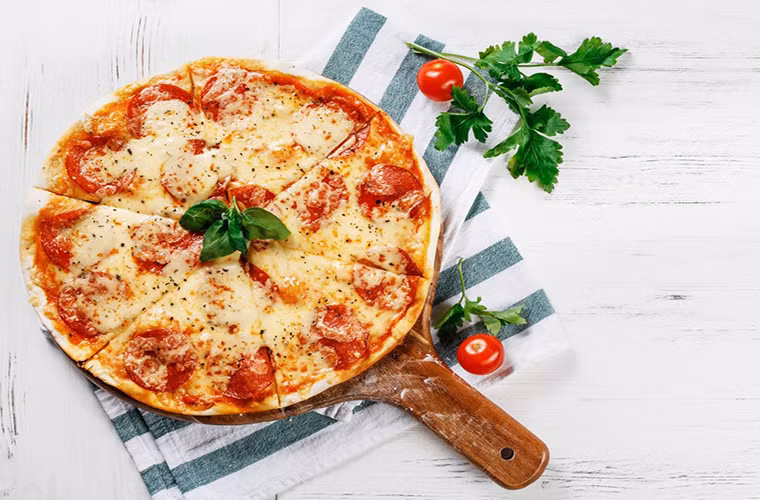 Món bánh pizza Pi Pizzeira cũng rất được cựu Tổng thống Mỹ ưa chuộng. Ảnh: BI.