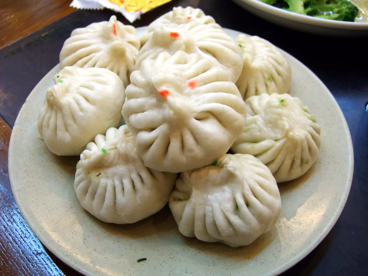 Bánh bao Cẩu Bất Lý ở Thiên Tân (Trung Quốc) vẫn được lưu truyền đến ngày nay và giữ nguyên cái tên "chó cũng không thèm" khiến nhiều người cảm thấy thú vị. Ảnh: Sohu, Sina.