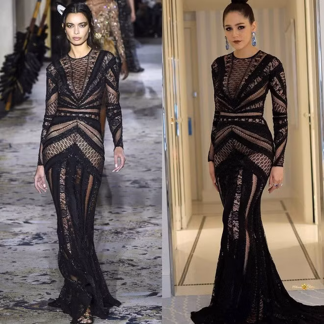 Kiểu đầm ren đen ôm sát giúp cô khoe đường cong cơ thể.