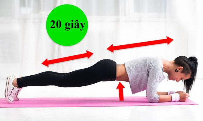 Tư thế hít đất: Bài tập này giúp đốt cháy chất béo, tăng cường cơ lưng, ngăn ngừa đau lưng và cải thiện tư thế. Cách thực hiện: Chống cẳng tay lên thảm, nâng cơ thể lên cao. Vai, hông, gót chân tạo thành đường thẳng và song song với sàn nhà. Giữ tư thế trong 20 giây.