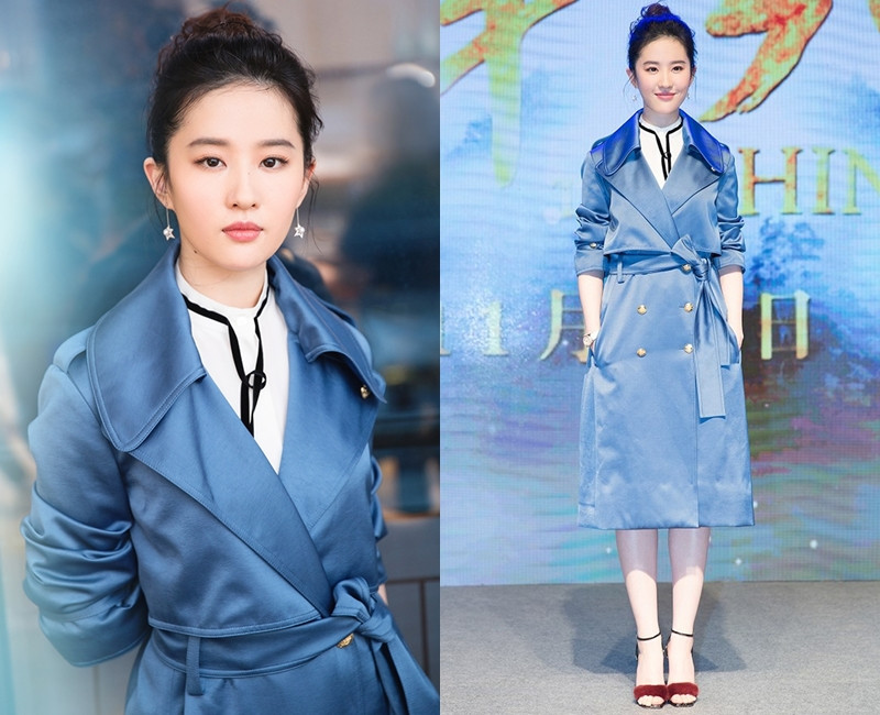 Cô diện áo choàng dài rất thanh lịch và sang chảnh.