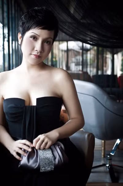 Ca sĩ Mỹ Linh từng nhiều năm trung thành với mái tóc tém.