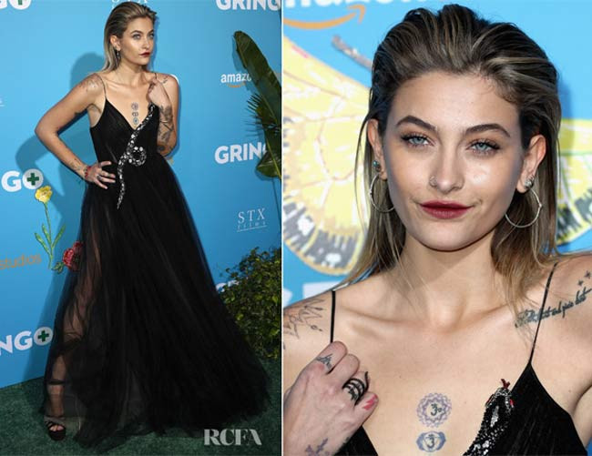 Cô chuộng những chiếc váy 2 dây khoe hình xăm ngực.