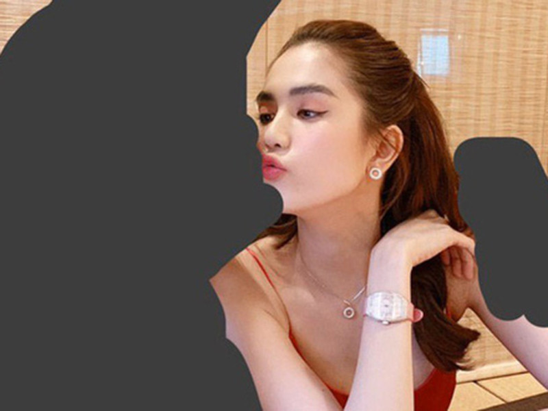 Chân dài gốc Trà Vinh được cho là đang hẹn hò trai trẻ sau khi úp mở bó hồng ngày Valentine và hình ảnh bên một người cô gọi là "cậu gấu".