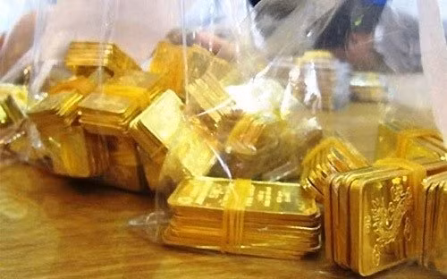 Gia vang hom nay 16/11: Tang chop nhoang roi lap tuc tut day