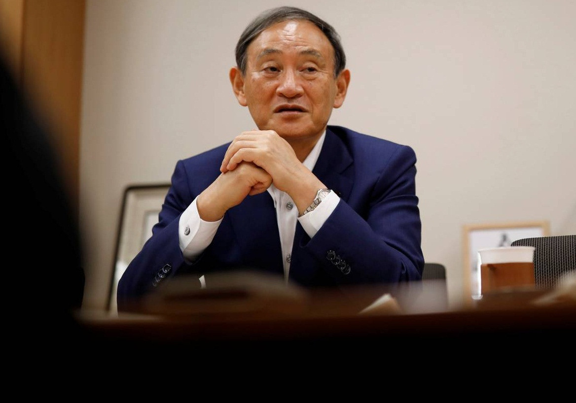 Được biết, ông Suga đã quyết định việc tham gia vào cuộc tranh cử Thủ tướng Nhật và dự kiến sẽ có công bố chính thức sau ngày 1/9. Ảnh: Reuters.