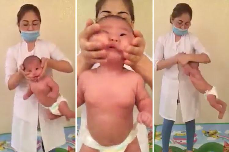 Người phụ nữ cầm đầu em bé lắc lư như búp bê. Ảnh: The Sun.