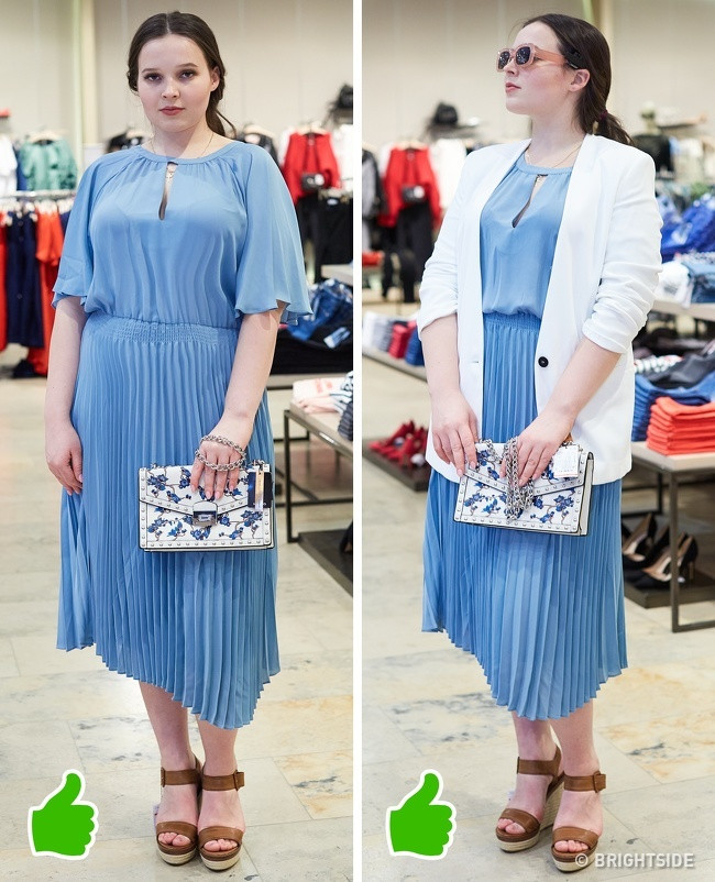 Một chiếc váy dài đơn sắc kết hợp với áo khóc vest dài sẽ giúp bạn trông nhỏ gọn hơn rất nhiều. Ngoài ra, việc xắn tay áo lên một chút cũng giúp bạn trông trông mảnh mai hơn. Ảnh: BS.